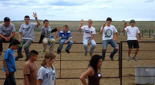 high-praise-ranch-team-builders-sitting-fence